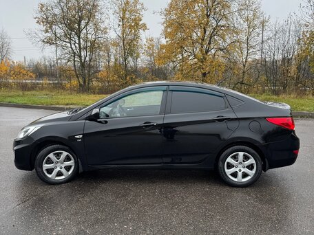 2011 Hyundai Solaris I, чёрный, 770000 рублей, вид 2