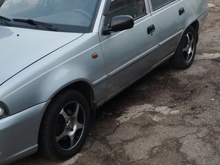 2012 Daewoo Nexia I Рестайлинг, серебристый, 298000 рублей, вид 2