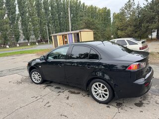 2012 Mitsubishi Lancer X Рестайлинг, чёрный, 850000 рублей, вид 4