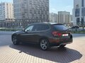 2013 BMW X1 18i I (E84) Рестайлинг, коричневый, 1350000 рублей - вид 5