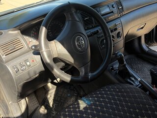 2003 Toyota Corolla IX (E120, E130), чёрный, 509000 рублей, вид 4