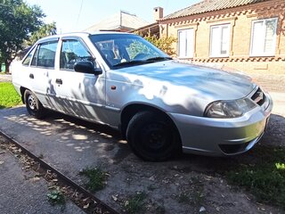 2012 Daewoo Nexia I Рестайлинг, серебристый, 270000 рублей, вид 1