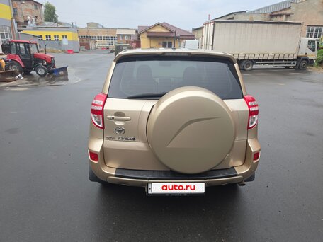 2010 Toyota RAV4 III (XA30) Рестайлинг, бежевый, вид 3