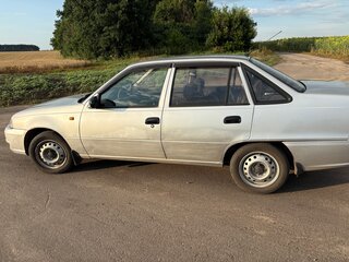 2010 Daewoo Nexia I Рестайлинг, серебристый, 200000 рублей, вид 5