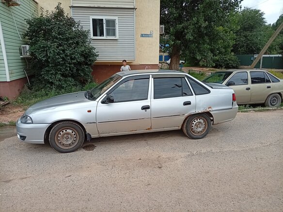2010 Daewoo Nexia I Рестайлинг, серебристый, 120000 рублей - вид 8