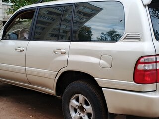 1999 Toyota Land Cruiser Cygnus 100 Series, серый, 1200000 рублей, вид 3