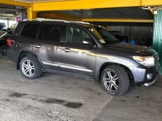 2012 Toyota Land Cruiser 200 Series Рестайлинг 1, серый, 2810000 рублей, вид 1