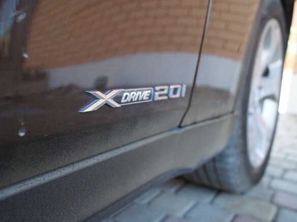2013 BMW X1 20i I (E84) Рестайлинг, коричневый, 1330000 рублей - вид 4