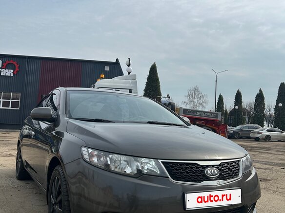 2011 Kia Cerato 6-speed II, золотистый - вид 3