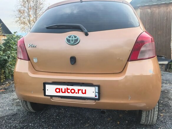 2005 Toyota Vitz II (XP90), оранжевый, 510000 рублей - вид 11