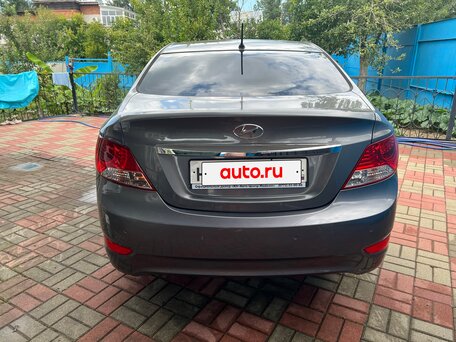 2013 Hyundai Solaris I, чёрный, 680000 рублей, вид 4