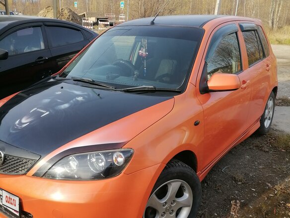2002 Mazda Demio II (DY), оранжевый, 410000 рублей