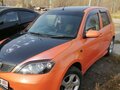 2002 Mazda Demio II (DY), оранжевый, 410000 рублей