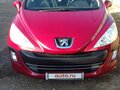 2010 Peugeot 308 I, красный