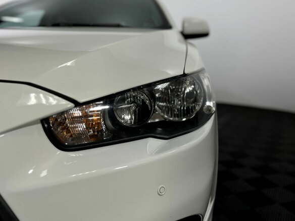 2013 Mitsubishi Lancer X Рестайлинг, белый, 960000 рублей - вид 17