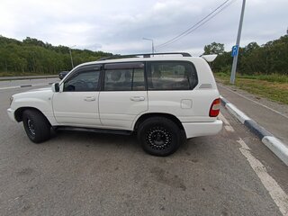 2005 Toyota Land Cruiser 100 Series Рестайлинг 2, белый, 2500000 рублей, вид 4