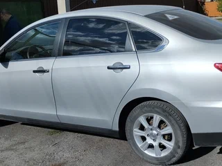 2014 Nissan Almera III (G15), серебристый, 1250000 рублей, вид 4