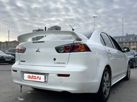 2008 Mitsubishi Lancer X, белый, 585000 рублей - вид 1