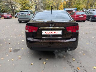 2011 Kia Cerato 6-speed II, пурпурный, 700000 рублей, вид 4