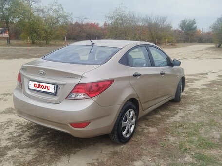 2011 Hyundai Solaris I, бежевый, 593000 рублей, вид 4