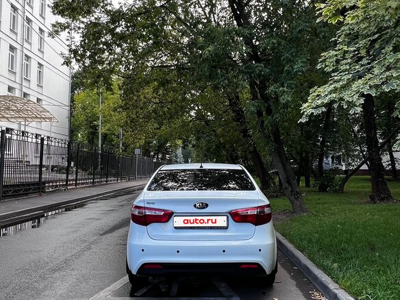 2014 Kia Rio 4-speed III, белый - вид 4