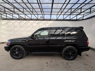 2004 Toyota Land Cruiser 100 Series Рестайлинг 1, чёрный, 1898000 рублей, вид 2