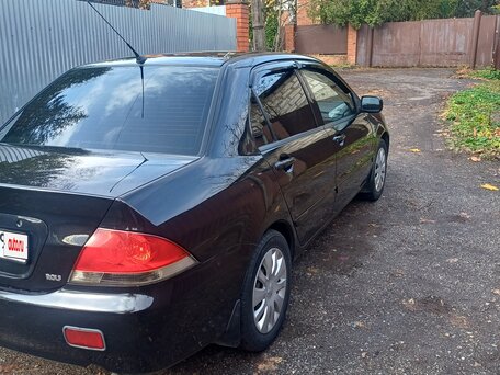 2005 Mitsubishi Lancer IX Рестайлинг, чёрный, 300000 рублей, вид 2