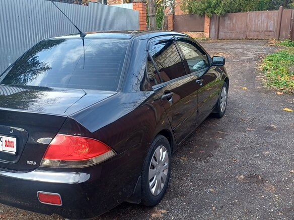 2005 Mitsubishi Lancer IX Рестайлинг, чёрный, 300000 рублей - вид 1