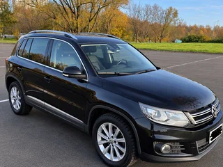 2014 Volkswagen Tiguan I Рестайлинг, чёрный, 1390000 рублей, вид 1
