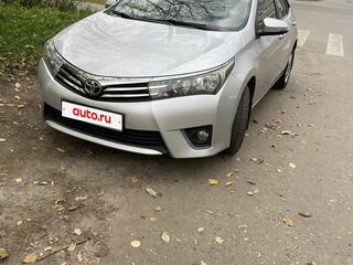 2013 Toyota Corolla XI (E160, E170, E180), серебристый, 870000 рублей, вид 2