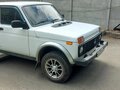 2010 Lada (ВАЗ) 2121 (4x4) I Рестайлинг, белый, 465000 рублей - вид 1