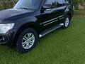 2013 Mitsubishi Pajero IV Рестайлинг 1, чёрный, 1470000 рублей - вид 5