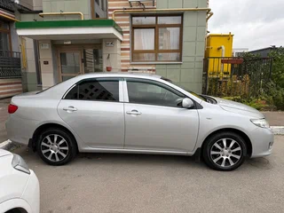 2008 Toyota Corolla X (E140, E150), серебристый, 645000 рублей, вид 5