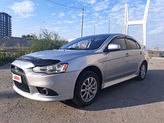 2012 Mitsubishi Lancer X Рестайлинг, серебристый, 895000 рублей, вид 2