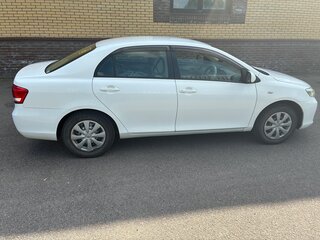 2010 Toyota Corolla Axio X (E140, E150) Рестайлинг, белый, 740000 рублей, вид 4