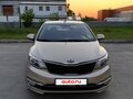 2015 Kia Rio III Рестайлинг, бежевый, 830000 рублей - вид 3