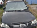 2000 Mazda Demio I (DW), чёрный, 100000 рублей