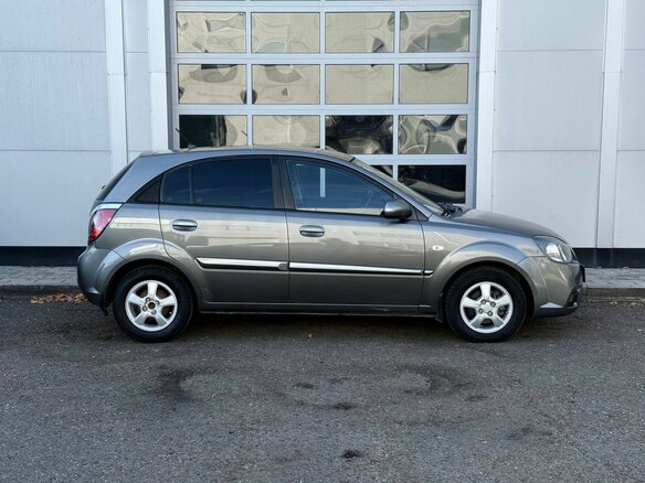 2010 Kia Rio II Рестайлинг, серебристый - вид 5