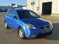 2010 Kia Rio II Рестайлинг, голубой - вид 2