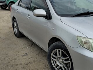 2008 Toyota Corolla Axio X (E140, E150), серый, 690000 рублей, вид 2