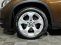 2013 BMW X1 20i I (E84) Рестайлинг, коричневый, 1345000 рублей - вид 6