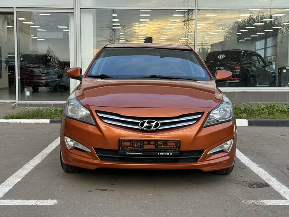 2014 Hyundai Solaris I Рестайлинг, оранжевый, 780000 рублей - вид 1