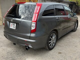 2010 Honda Stream II Рестайлинг, серый, 880000 рублей, вид 4
