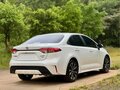 2023 Toyota Levin XII (E210) Рестайлинг, белый, 1460000 рублей - вид 3