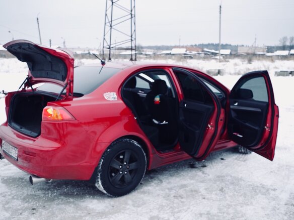 2007 Mitsubishi Lancer X, красный - вид 9