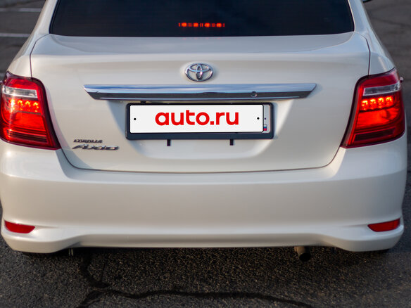 2016 Toyota Corolla Axio XI (E160, E170, E180) Рестайлинг 1, белый, 925000 рублей - вид 3