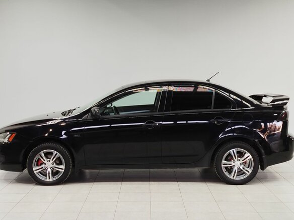 2010 Mitsubishi Lancer X, чёрный, 750000 рублей - вид 7