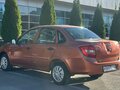2014 Lada (ВАЗ) Granta I, оранжевый, 325000 рублей - вид 3