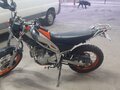 2010 Yamaha XG250 Tricker, оранжевый - вид 2