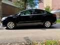 2017 Kia Rio III Рестайлинг, чёрный - вид 4